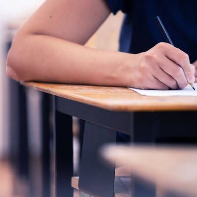 Student writing final exam in classroom 2026 01 09 08 07 51 utc